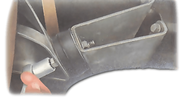 One type of mounting used on a transverse engine has a single central bolt, which is removed. The engine is raised sufficiently to prise away the rubber mounting